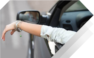 women driving relaxed with comprehensive and collision insurance coverage