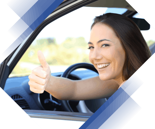 Cheerful woman driving her car