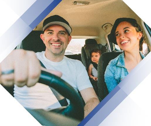 happy family traveling in their car